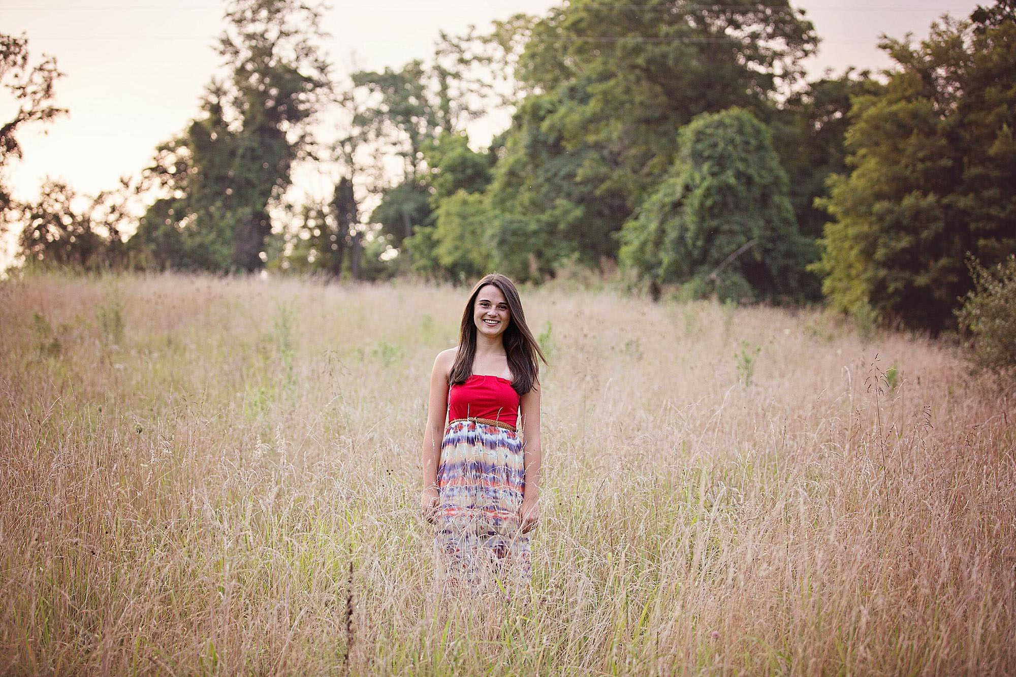 senior girl in a field